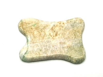 Traditional Chinese medicine - Gua Sha concave in Jade - light green with yellow highlights
